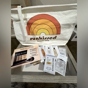 Madewell Traveled Pouch & (8) Skincare and makeup samples. NWT.